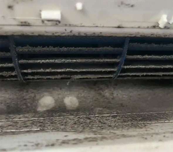 疏附空调吹的风有股烧焦味是怎么回事